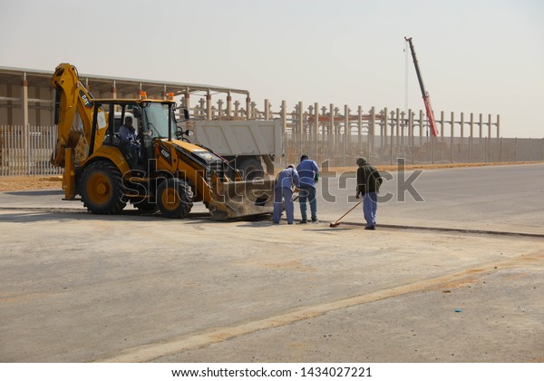 Workers working in the street cleaner in Riyadh,\
Saudi Arabia, January\
2019\
\
