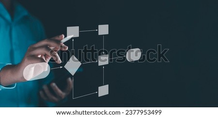 Workflow computer automation for business office. Developer writing flowchart to process workflow set plan and manage project data document. Computer git software system. Business technology