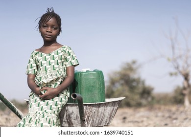 Working African ethnicity Infant getting pure Water in a natural environment
