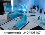 working atmosphere in the laboratory, chemistry and science specialist working in a lab with various experimental equipment and substances, experimental professional working in the lab