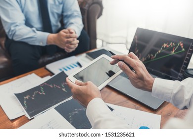 Working Business Man, Team Of Broker Or Traders Talking About Forex On Multiple Computer Screens Of Stock Market Invest Trading Financial Graph Charts Data Analysis.