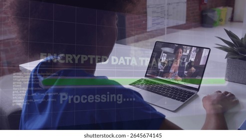Working clinician in blue scrubs typing on laptop at desk, with encrypted data overlay, copy space. Medical, technology, communication, professional, workplace, digital, healthcare - Powered by Shutterstock - Get 15% off with code: PIKWIZARD15