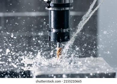 Working Closeup CNC Turning Cutting Metal Industry Machine Iron Tools With Splash Water.