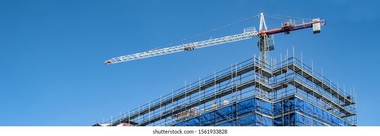 A Working Construction Crane On A New High Rise Multistory Building Site. Gosford, New South Wales, Australia.