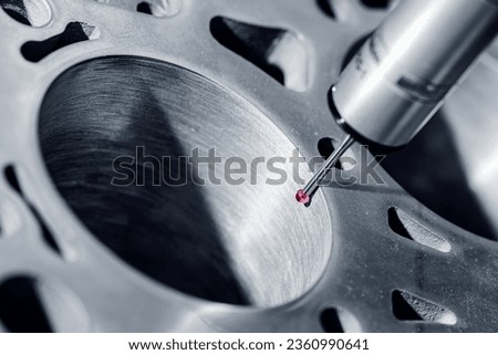 Working Coordinate Measuring machine probe CMM on milling work. Sensor quality control after machining CNC industrial metal.