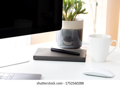 Working creative workspace with  coffee cup and notebook - Shutterstock ID 1752560288
