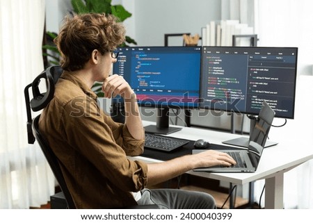 Working IT developer with stressful overworked in creating online software development coding on pc screen, thinking program for latest version application on website project at modern office. Gusher.