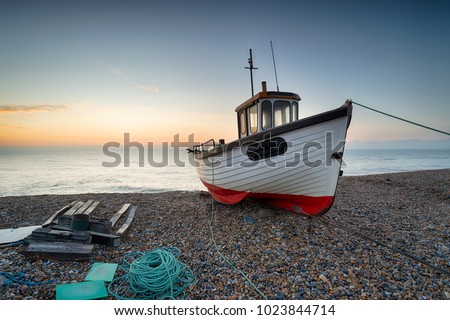 A working fishing boat on the beach at Dungeness on the Kent coast