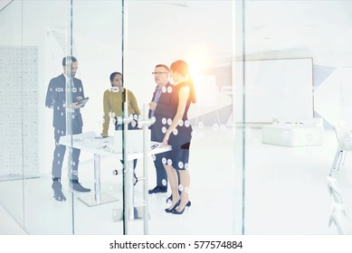 Working Group Of Male And Female Journalists Preparing Publication For Tv Storyline Sharing Opinions For Best Ones Discussing In Modern Newsroom With Digital Devices And Wireless Connection To Network