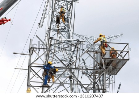 Working at height building an electricity tower