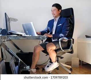 Working From Home: Man Wearing A Suit For The Video Call While Also Wearing Sweatpants