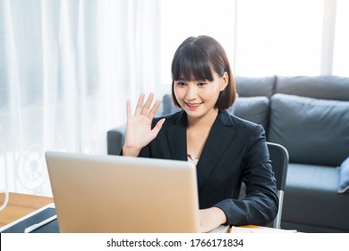 Working At Home Modern Office Businesswoman Meeting Team Online Video Chat Conference Discussing Planning View Of A Person Wearing A Suit Or Business Wear On Top And Sweatpants Or Boxers On Bottom