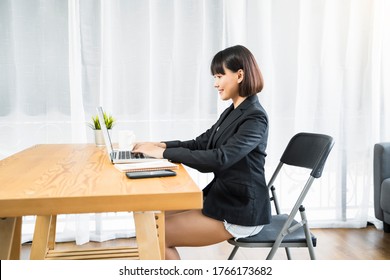 Working At Home Modern Office Businesswoman Meeting Team Online Video Chat Conference Discussing Planning View Of A Person Wearing A Suit Or Business Wear On Top And Sweatpants Or Boxers On Bottom