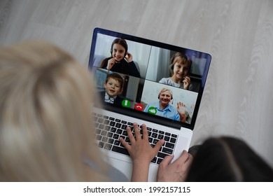 Working from home office with kid. Happy mother and daughter shopping online, using laptop together. Woman hugging child. Freelancer workplace at kitchen table. Female business, virtual communication. - Shutterstock ID 1992157115