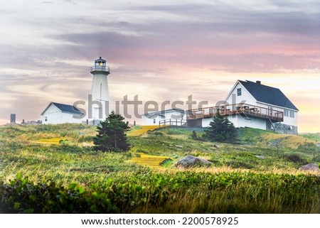 A working lighthouse at Cape Spear during sunset along the East Coast of Canada