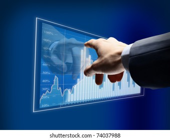 Working man drawing color graphics devoted to business - Powered by Shutterstock