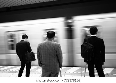 Working Men Are Waiting For The Train