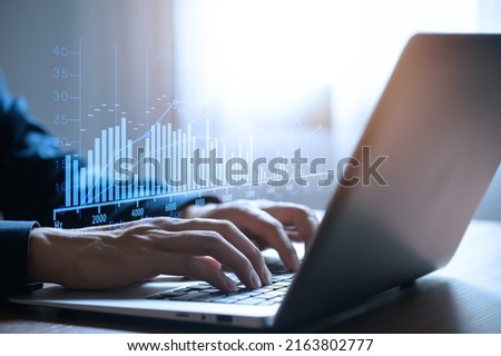 working modern computer dashboard analyzing finance sales data, planning ,strategy, Stock market, Business growth, progress, success concept. trader growing virtual hologram stock, invest in trading.