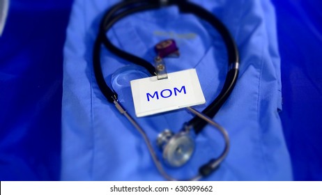 Working Mom / Women In Healthcare/ Blue Scrubs With Stethoscope And Name Badge.  