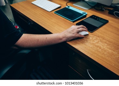 Working Mother With A Baby And Her Computer