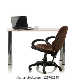 Working in the office, a chair, a table, a laptop. Isolated on white.
