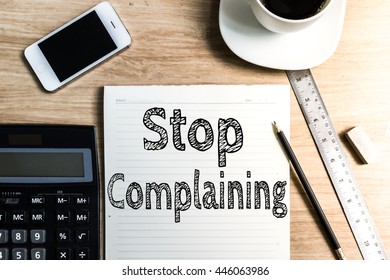 WORKING OFFICE NOTE STOP COMPLAINING CONCEPT (with Warm Tone and Sunlight Shining)
