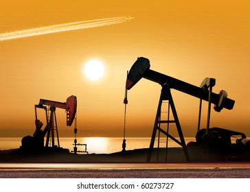 Working oil pump in rural place at sunset - Powered by Shutterstock