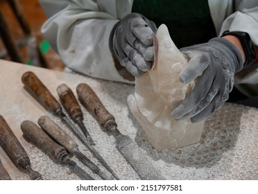 Working On Alabaster Sculpture. Various Tools On The Workbench.