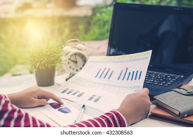 Working On A Desk Numerical Analysis, Financial Accounting. Graphing 