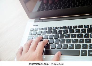 Working on a laptop - Powered by Shutterstock