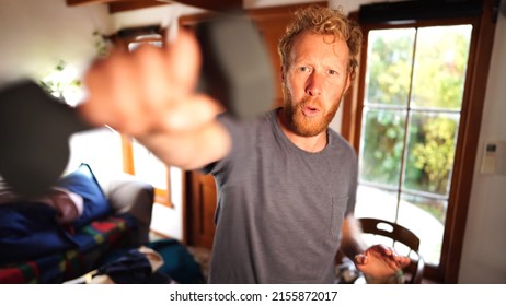 Working out at home, punching towards camera - Powered by Shutterstock