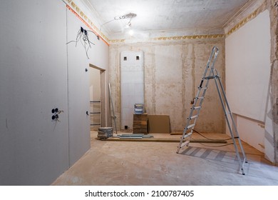 Working process of installing gypsum walls from plasterboard -drywall - in apartment is under construction, remodeling, renovation, extension, restoration and reconstruction.