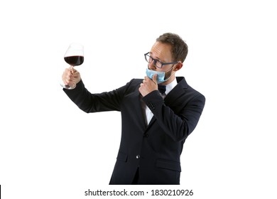 Working In Protective Face Mask. Portrait Of Male Sommelier, Wine Steward Or Bar Worker In White And Black Suit Isolated Over White Background. Copyspace For Ad. Concept Of Professional Occupation