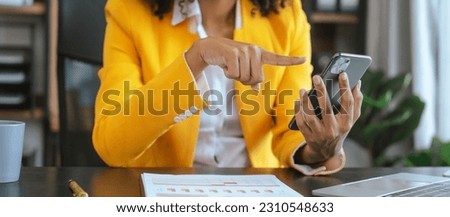 Working smart, African american business woman working audit balance sheet, job order costing, revenue recognition, break-even analysis, appropriated retained earnings, earned surplus, capital gain