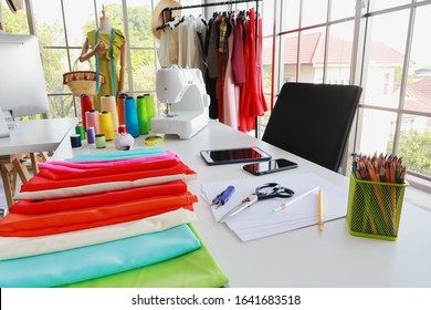 Working space of fashion designer, dressmaker or tailor. Dressmaking ,fashion design background.