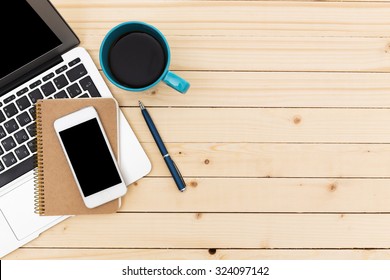 Working Space. Laptop, Notepad On Wooden Desk