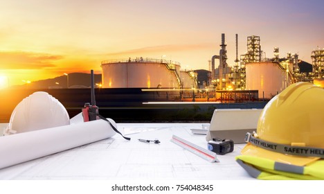 Working Table Engineer With Tablet And Tools In Oil Refinery Industry Business Plant.