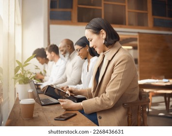 Working team, coffee shop and collaboration of web design group with technology in cafe. Diversity, analytics and research strategy writing of staff in a restaurant on tech at coworking space - Powered by Shutterstock