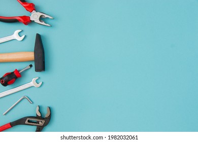 Working tools on a blue background. Father's day celebration concept. Copy plasticity for text.