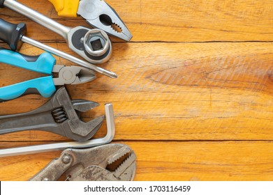 Working tools on wooden rustic background. top view. - Powered by Shutterstock