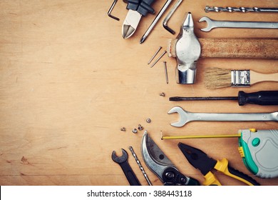 Working tools on wooden rustic background. top view - Shutterstock ID 388443118