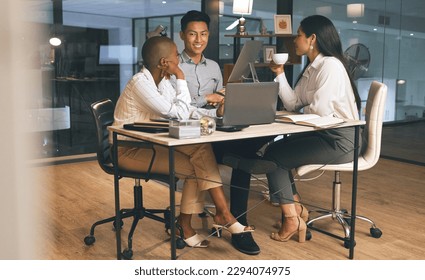 Working towards a mutual goal. Shot of a group of businesspeople working late in a modern office. - Powered by Shutterstock