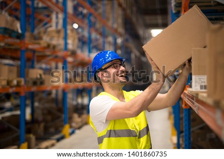 Similar – Image, Stock Photo Positive warehouse workers carrying heavy box