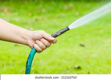 working-watering-garden-hose-260nw-212163763.jpg