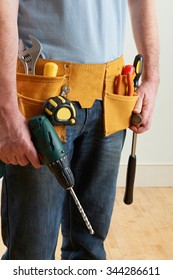 Workman Wearing Toolbelt