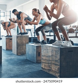 Workout, class and people with jumping in group for exercise, fitness and training for power challenge. Sports, crowd or performance in gym club for health, strong legs or athlete on box for wellness - Powered by Shutterstock