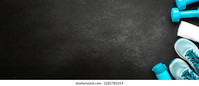 Workout and fitness concept, sport equipment at black background. Long banner format. - Powered by Shutterstock