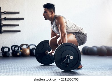 Workout, weightlifting and man doing deadlift training with strength, weights and motivation in fitness gym. Bodybuilder, sport and strong athlete doing power exercise with a dumbbell at health club - Powered by Shutterstock