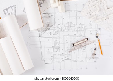 Workplace of architect. Engineering tools for creating new architectural project on table, top view