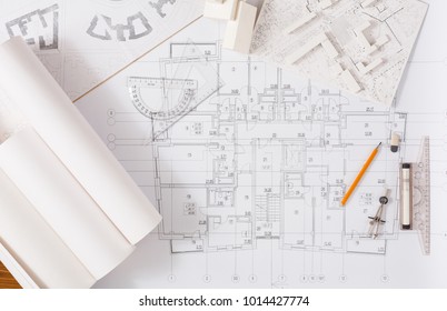 Workplace of architect. Engineering tools for creating new architectural project on table, top view